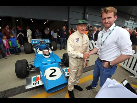 Taylor Walsh and Sir Jackie Stewart at the Silverstone Classic 2019
