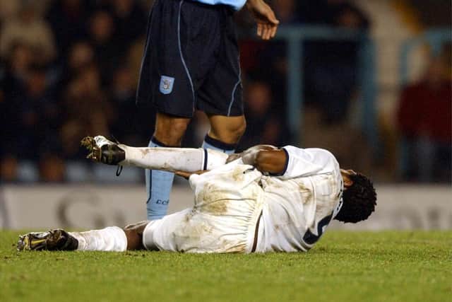PNE striker Ricardo Fuller goes to ground with a knee injury against Coventry