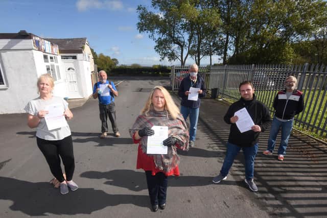 Janine Berry, Tony Hall, Terry Williams, Leanne Murray, Joe Berry and Anthony Taylor have all been issued with a PCN for stopping in the lay-by on Park Lane in Preesall, outside Sloanes Self Storage. They have vowed to put a stop to the parking charges. Photo: Daniel Martino - JPI Media