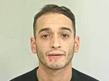 Dominic Battiniello, 28, from Preston, is wanted in connection with breaching a domestic violence protection order. Pic: Lancashire Police