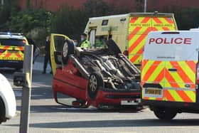 Emergency services rushed to the scene of the two-car crash in Marsh Lane, near the junction with Strand Road, where a red Vauxhall overturned shortly before 10am on Tuesday (September 29)