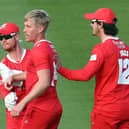 Lancashire’s Luke Wood (centre) is congratulated after taking the wicket of Sussex batsman Delray Rawlins