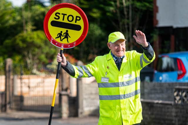 Hugh has been helping children to safely cross Brownedge Road at the end of Avondale Road in Lostock Hall for the past 17 years.