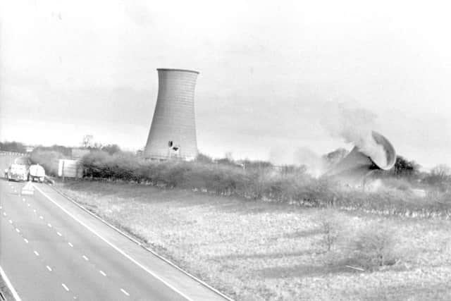 Cooling towers at Courtaulds in Red Scar being demolished