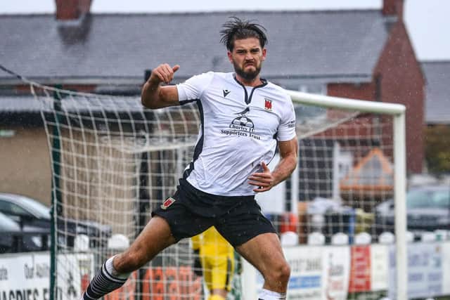 Harry Cardwell celebrates his goal