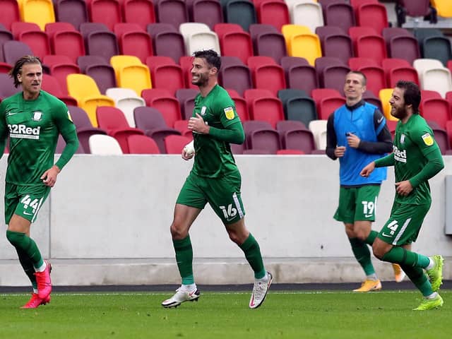 Preston North End's Brad Potts celebrates scoring his side's third goal against Brentford with Andrew Hughes and Ben Pearson