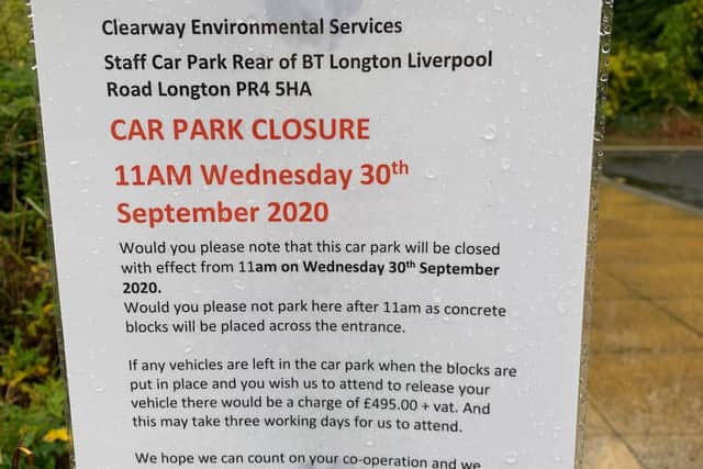 A sign on display at the car park