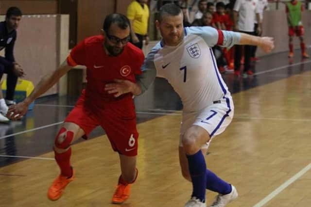 Stephen Daley (right) in action for England. Image courtesy of Futsal Focus