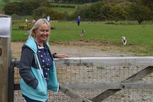 Sue Knight, who has opened up the field at her home for dogs to exercise (image: Neil Cross)