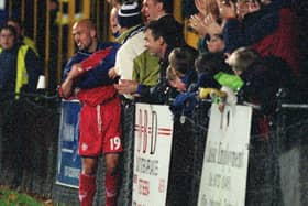 Bjarki Gunnlaugsson celebrates with the Preston North End fans after scoring against Enfield in the FA Cup in November 1999