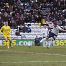 Jon Parkin fires Preston North End's second goal against Cardiff at Deepdale in February 2010