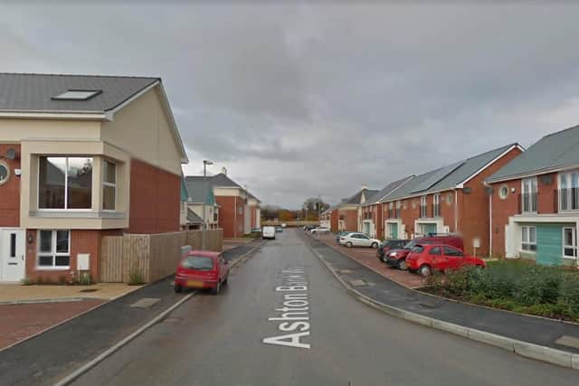 Two shots were fired from a "white saloon type car" as it was being driven along Ashton Bank Way. (Credit: Google)