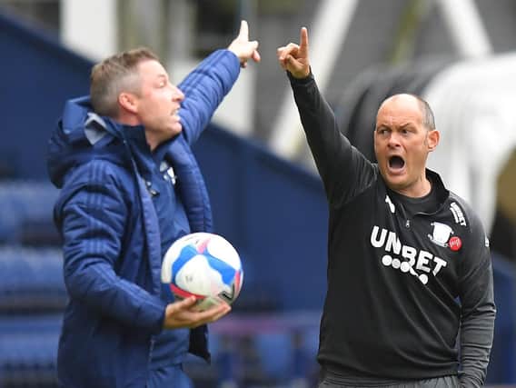 Preston boss Alex Neil and Cardiff manager Neil Harris try to point their side in the right direction