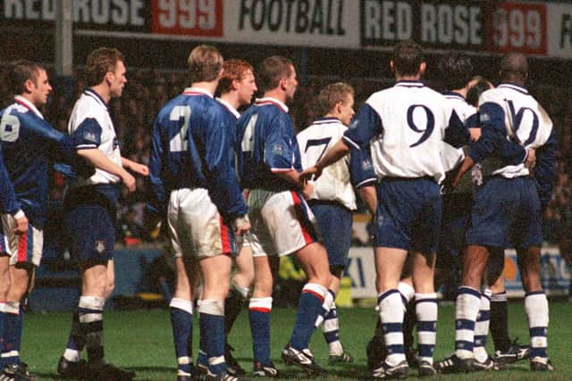 A flash point in Preston North End's defeat to Carlisle at Deepdale in February 1998 involving PNE's No.10 Habib Sissoko and John Mullin (No.9)