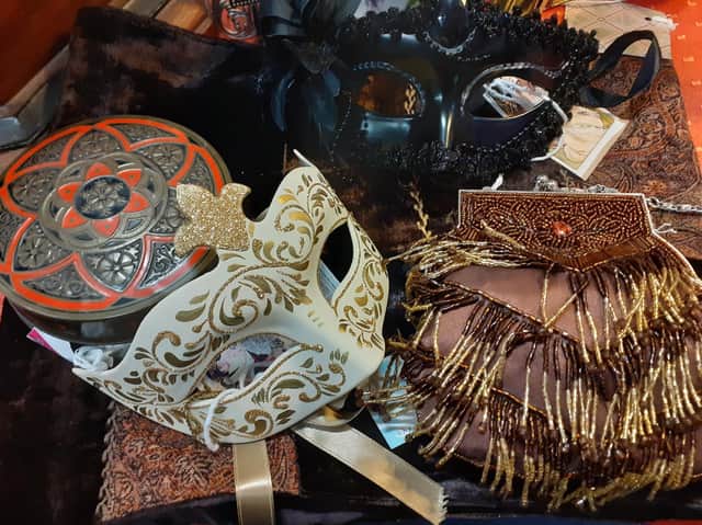 Masks and glamorous accessories for a night at the theatre