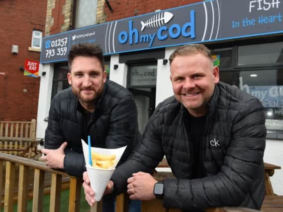 Oh My Cod owners Chris Mayor and James Sheehan are offering hungry youngsters free chips.