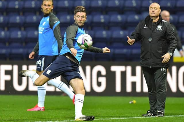 Preston North End midfielder Paul Gallagher and first-team coach Frankie McAvoy
