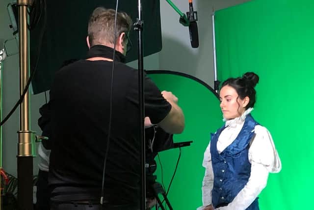 Beth Nolan gets into character as she perfects her green screen technique at a studio in Skipton