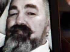 Paul Dukes has been described as white, 5ft 8in tall, of large build with cropped, greying hair and a long beard. (Credit: Lancashire Police)