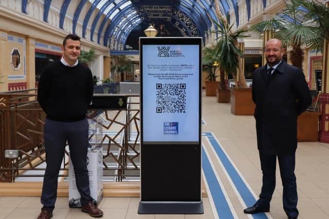 Darren Spedding of Bispham-based Leisure Channel and Anthony Williams from the Winter Gardens after a six year deal was signed to provide digital screens for the historic venue