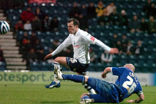 PNE winger Ross Wallace rides a challenge from Birmingham's Lee Carsley