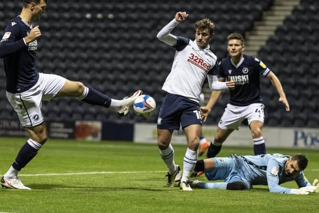 Preston North End midfielder competes for the ball in the Millwall box at Deepdale on Wednesday night