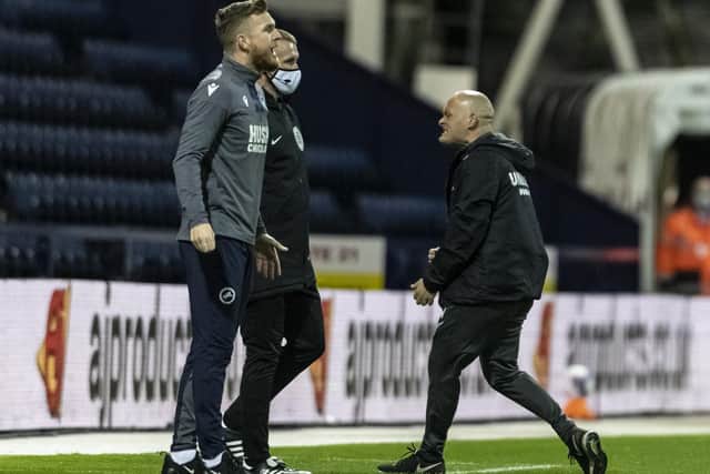 Alex Neil cuts a frustrated figure on the touchline during PNE's defeat to Millwall