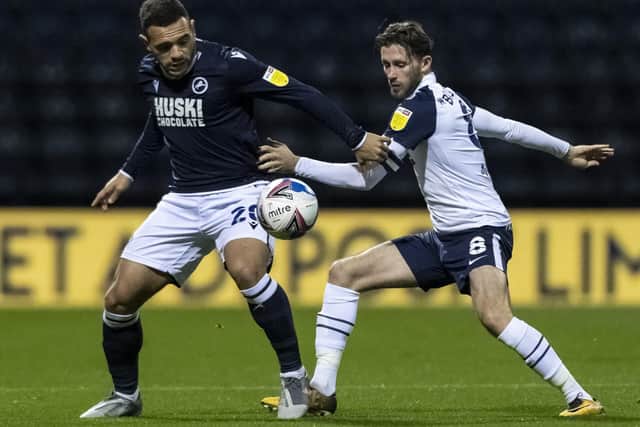 Preston North End’s Alan Browne competing with Millwall’s Mason Bennett (left)