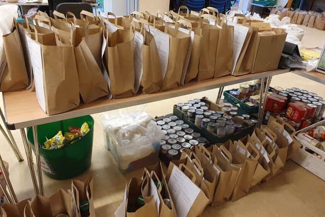Food bags lined up and ready to go at the Wade Hall Community Association