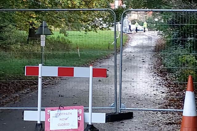 Security fencing now surrounds the Hall site