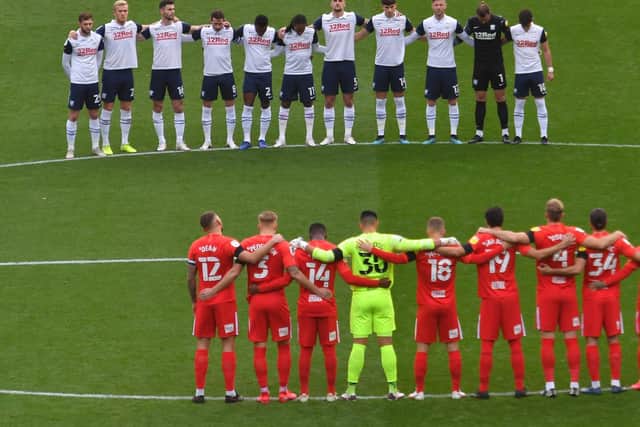 Preston and Birmingham players observe a minute's silence in memory of football legend Nobby Stiles who passed away on Friday