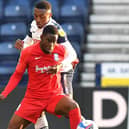 Preston North End's Darnell Fisher battles with Birmingham City's Jonathan Leko