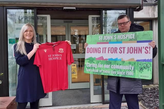 Mazuma, have become the main shirt sponsors for Morecambe Shrimps’ FA Cup campaign and have donated that space to St John’s Hospice. Pictured are Suzanne Parker, Mazuma and Martin Thomas, on behalf of The Shrimps.