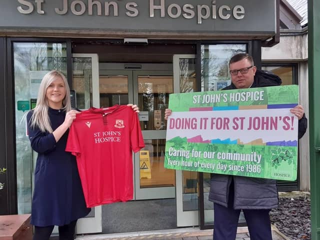 Mazuma, have become the main shirt sponsors for Morecambe Shrimps’ FA Cup campaign and have donated that space to St John’s Hospice. Pictured are Suzanne Parker, Mazuma and Martin Thomas, on behalf of The Shrimps.