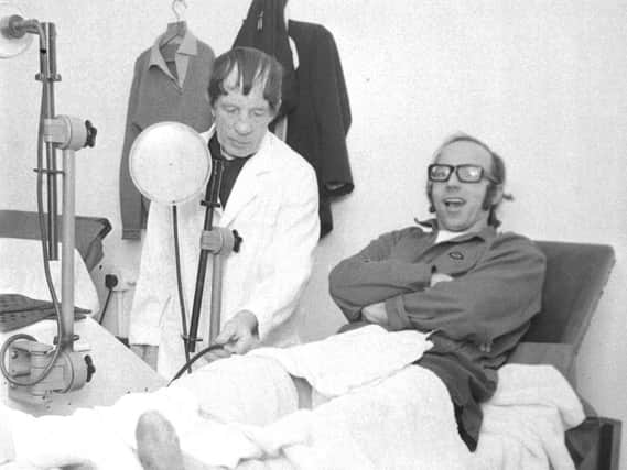 Nobby Stiles gets some treatment off PNE trainer Harry Hubbick during his time as a player at Deepdale