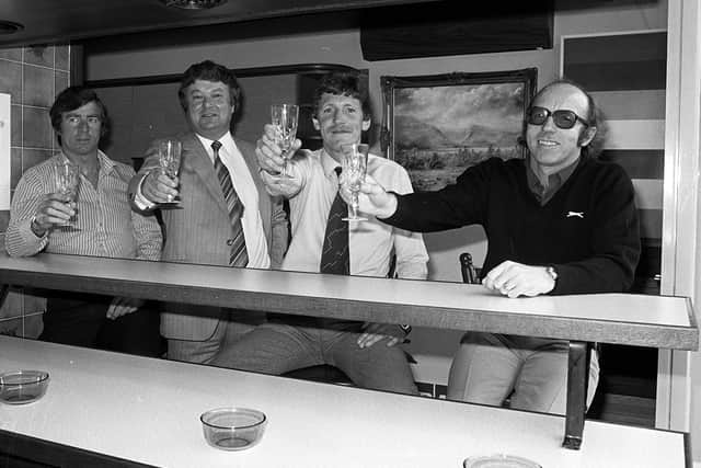 Nobby Stiles (right) with his PNE assistant Alan Kelly (far left) during a promotion visit to a local brewery