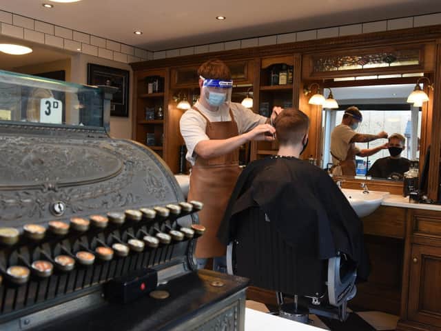 Ike Walmsley says his shop has delivered nearly 100 haircuts in a day.