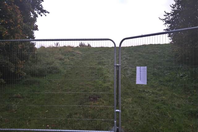 The hill, popular with locals for sledging in winter, has also been blocked off with fencing and signs