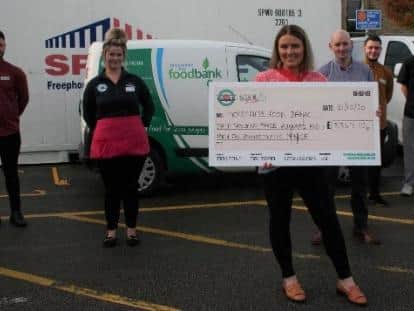 Staff from the Soul Bowl in Morecambe with their cheque for Morecambe Bay Foodbank.