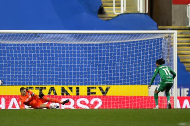 PNE's Daniel Johnson sees his penalty hit the legs of Reading goalkeeper Rafael