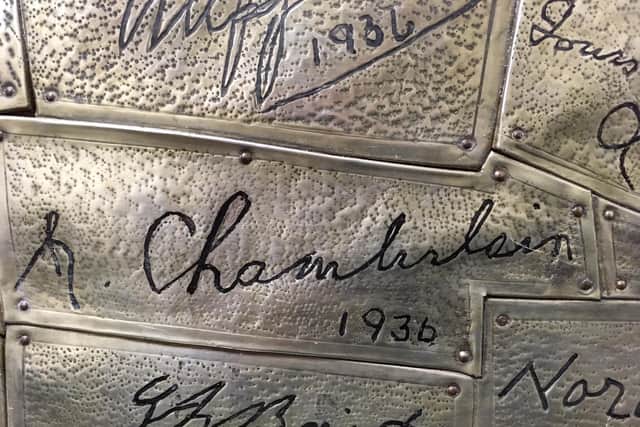 Up for auction is a jewelled casket covered in signatures including that of the Prime Minister Neville Chamberlain dated 1936.