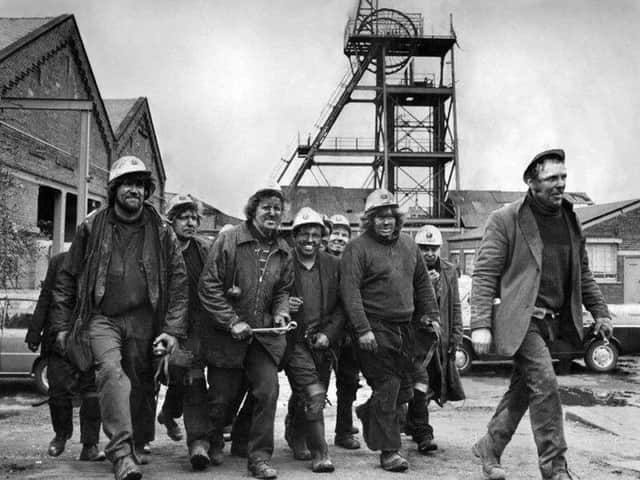 Hapton Valley miners leaving the lamp room