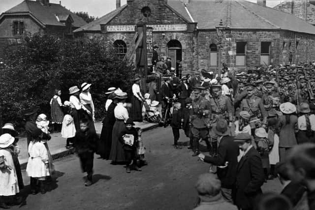 Lancaster's residents lining the streets to see the soldiers of the King's Own Royal Regiment march past after the outbreak of war in 1914