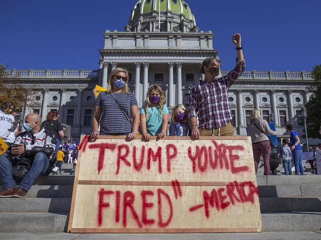“You’re fired”: America has spoken (Mark Pynes, The Patriot-News via AP)