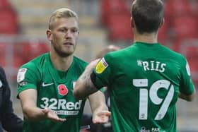 Substitute Jayden Stockley (left) hit the post in stoppage time to almost earn a point for PNE at Rotherham