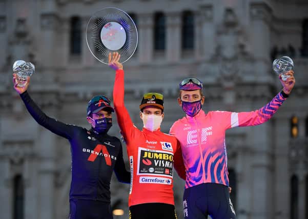 Primoz Roglic on the podium with Richard Carapaz (left) and third-placed Preston rider Hugh Carthy (right) in  Madrid (photo: Getty Images)