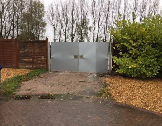 A fence separating Cottage Gardens in Bamber Bridge from a proposed new development beyond it (image: Peter Carter)