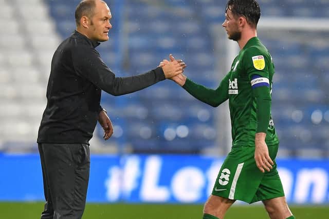 Preston North End manager Alex Neil and skipper Alan Browne after the win against Huddersfield