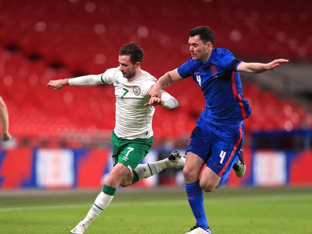 Alan Browne chases for the ball with Michael Keane at Wembley