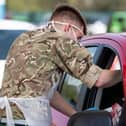 Soldiers are on standby for deployment to other areas of England, after Liverpool became the first city to pilot the mass coronavirus testing procedure.